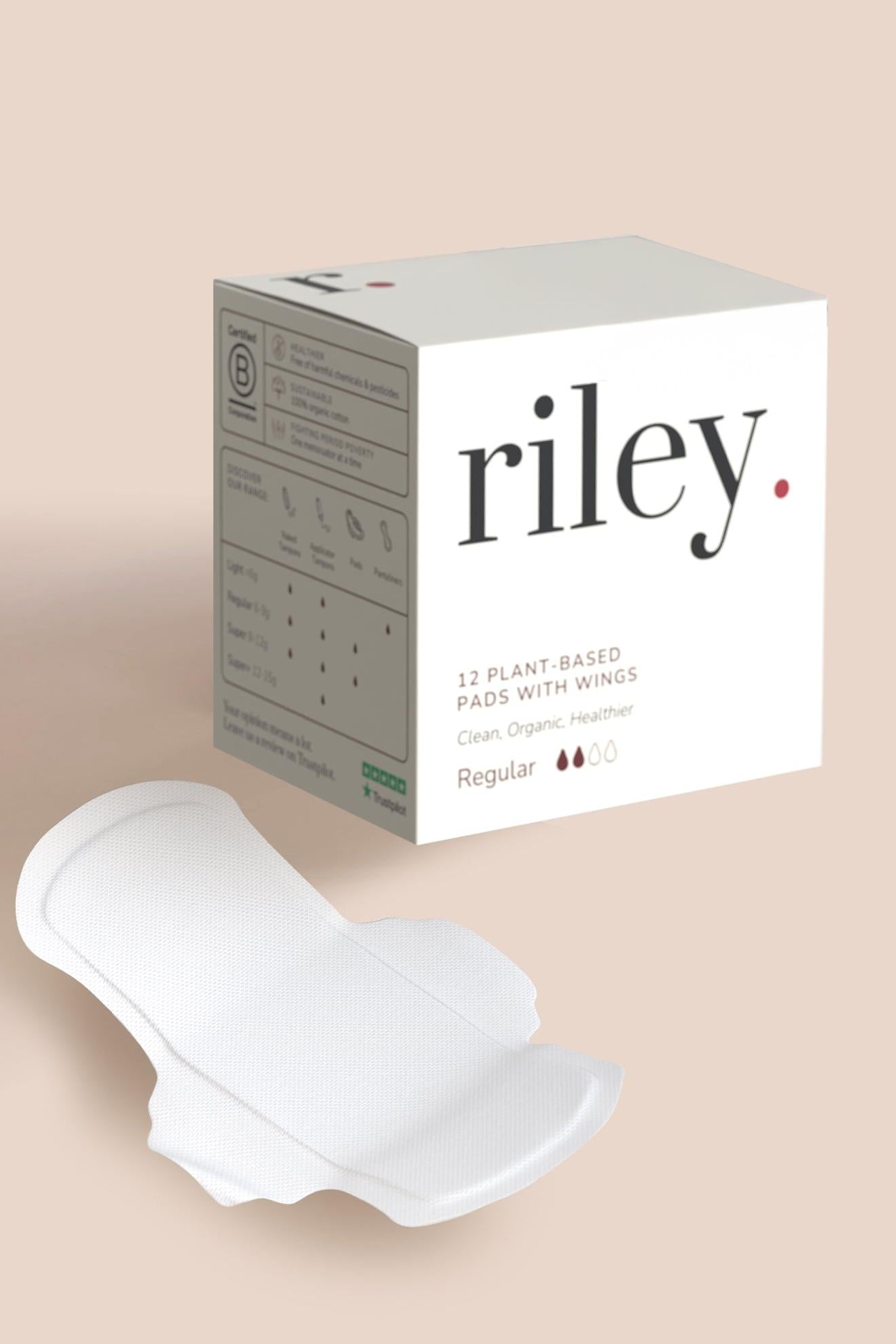 White sanitary pad and 'riley' branded box on a beige background