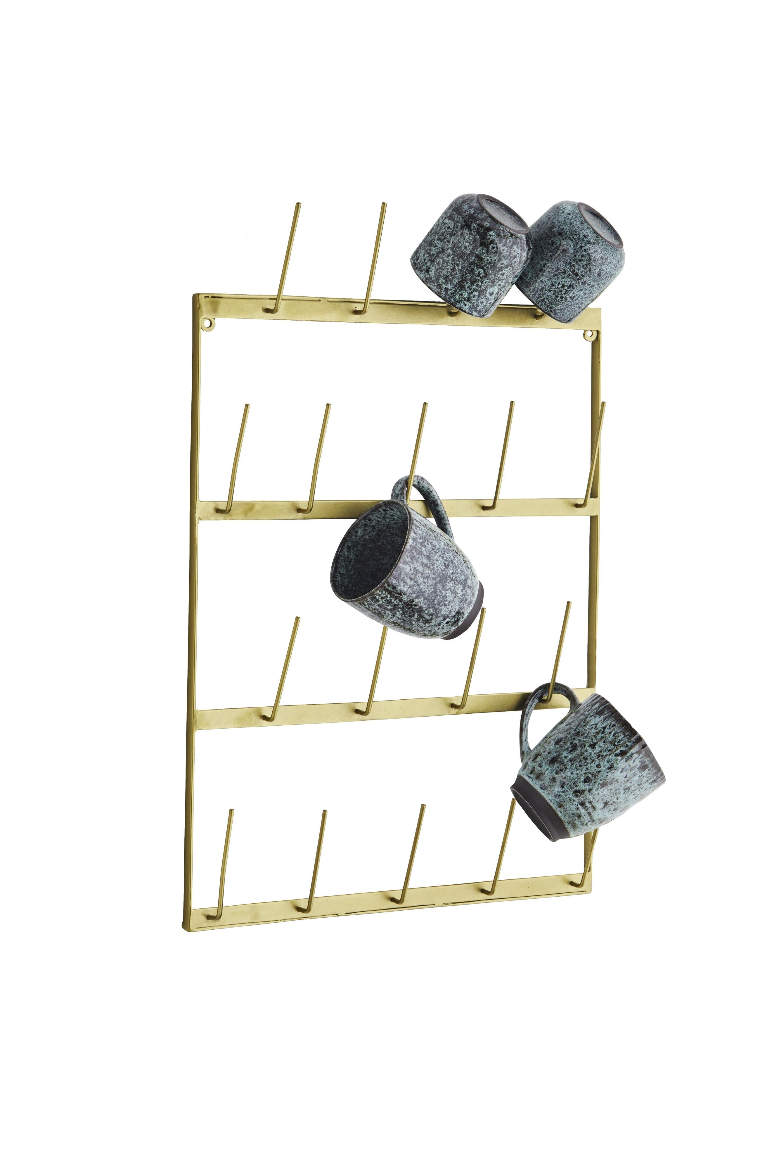 Gold mug rack with gray mugs on a white background