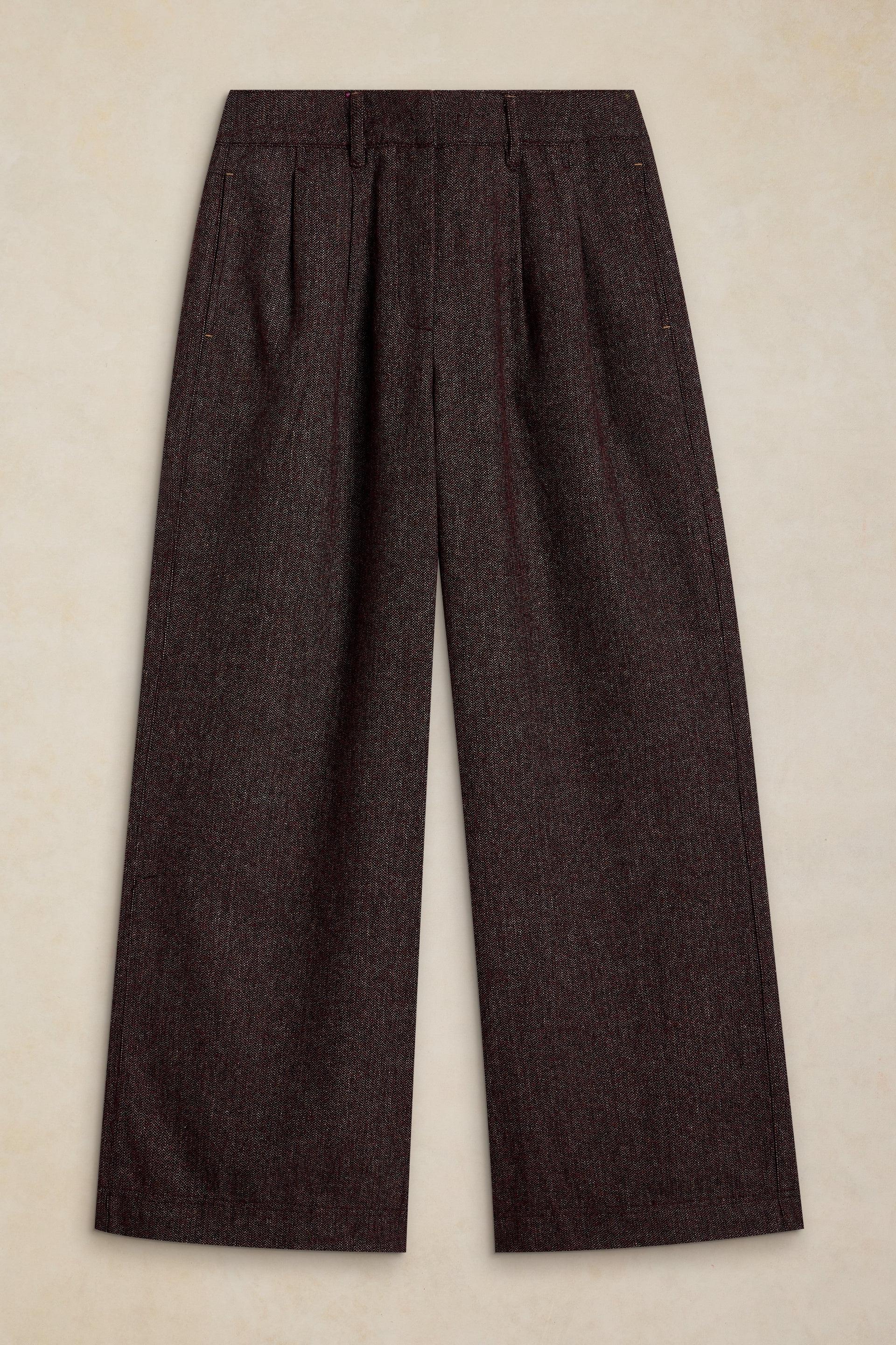 Brown wool trousers on a white background