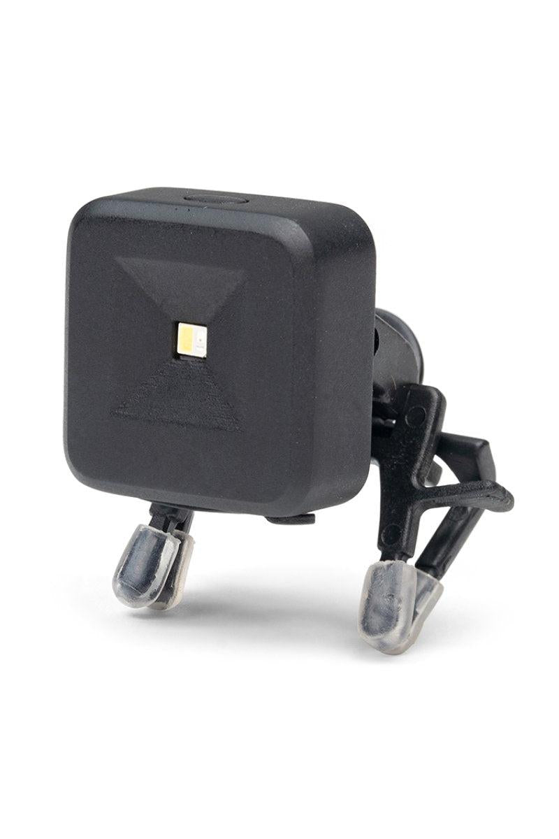 A small clip on flash light for books or on reading glasses