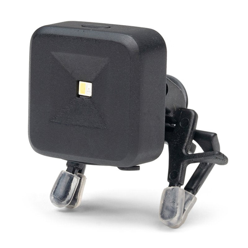 A small clip on flash light for books or on reading glasses