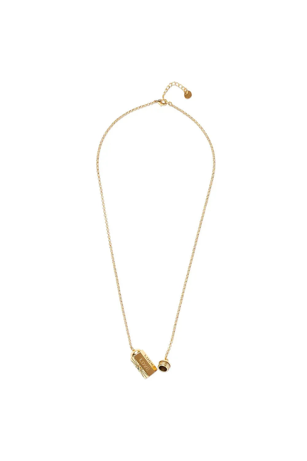 Gold necklace with cylindrical pendant on a white background