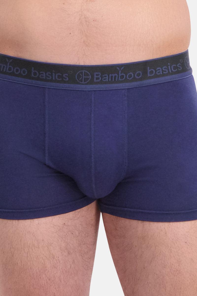 Navy blue boxer briefs with a visible brand logo on a white background