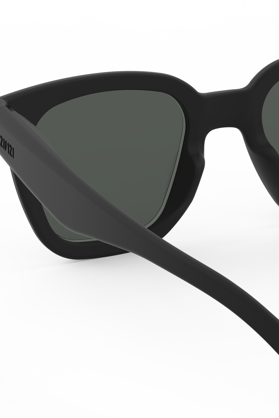 Black oversized rectangular sunglasses shown at an angle highlighting clean sharp lines.