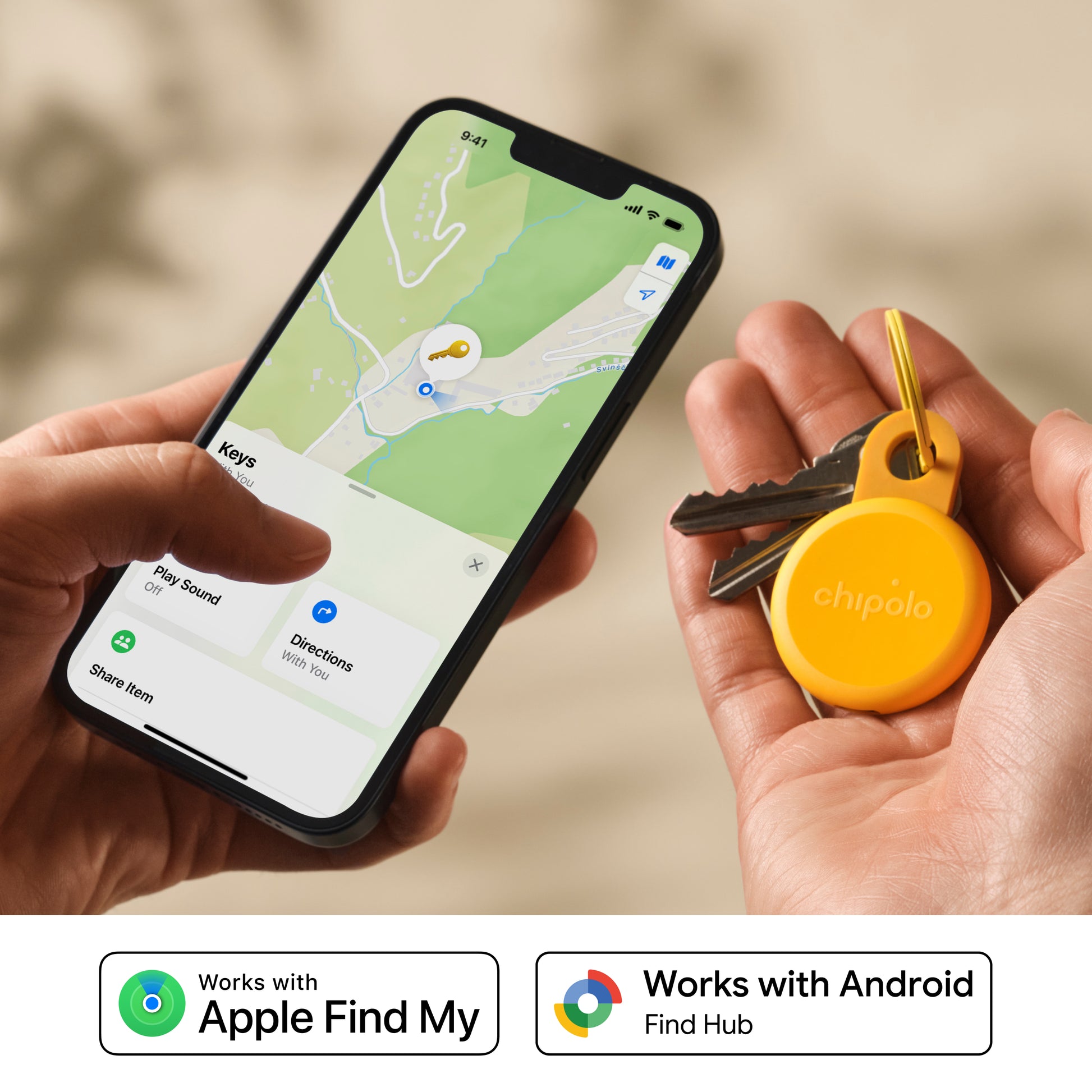 Person holding a smartphone with a mapping app and a Chipolo tracker on keys.