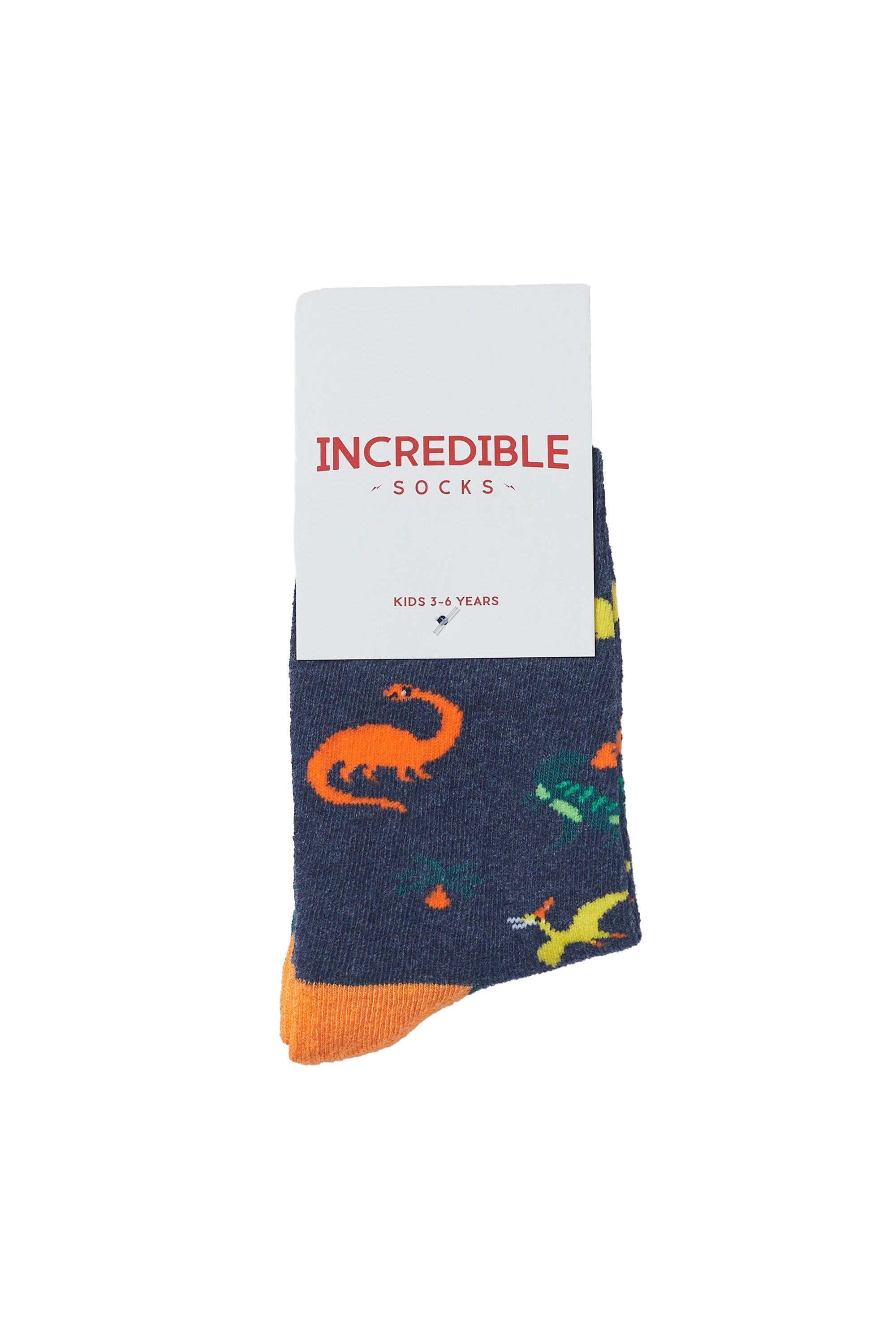 Children's sock with dinosaur pattern on a white background