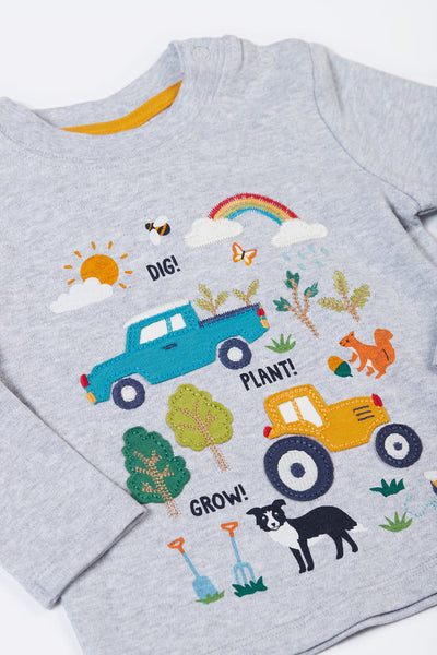 Close up of farm design with digger, dog and truck on grey organic cotton long sleeve top 