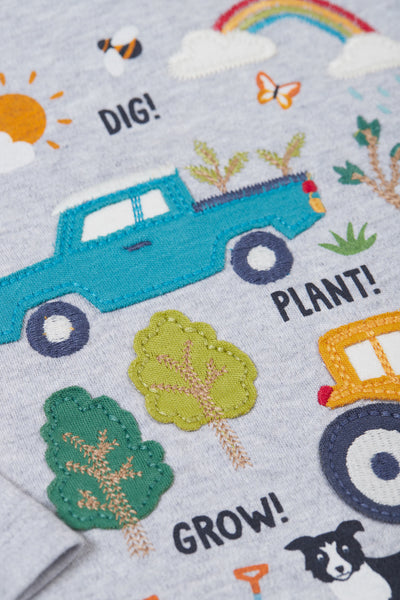 Close up of embroidery detail on Frugi grey organic cotton long sleeve top 