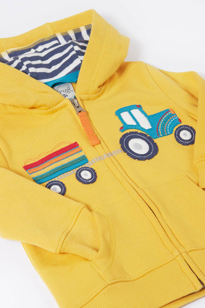 Close up tractor and trailer embroidery detail on organic cotton hoodie for kids