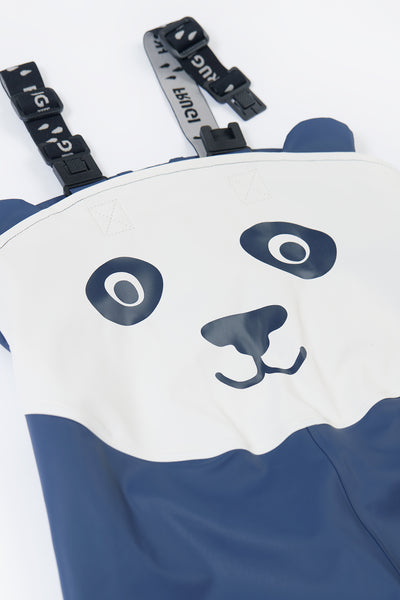Close-up of a blue and white panda-themed overalls with straps