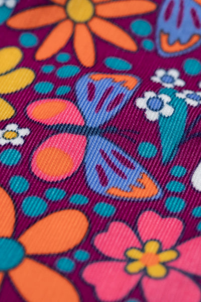 Colourful floral pattern on a fabric background