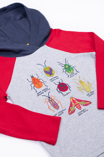 Close up of bug design on GOTS organic cotton hooded top 