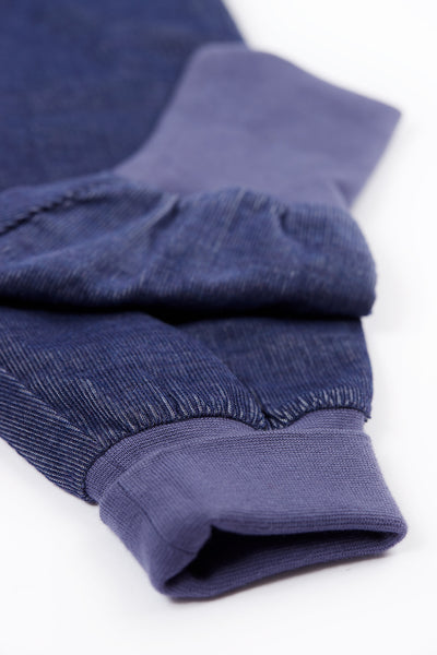 Folded blue fabric on a white background