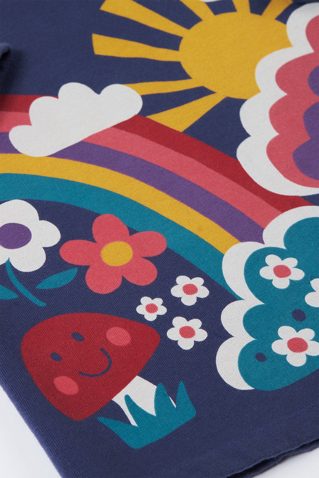 Colorful design with sun, rainbow, flowers, and heart on a dark blue background