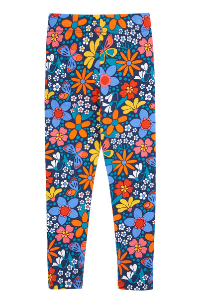 Colourful floral Frugi leggings on a white background