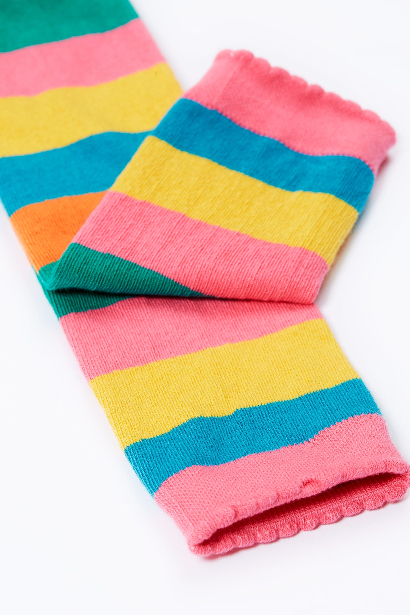 Colorful striped tights on a white background