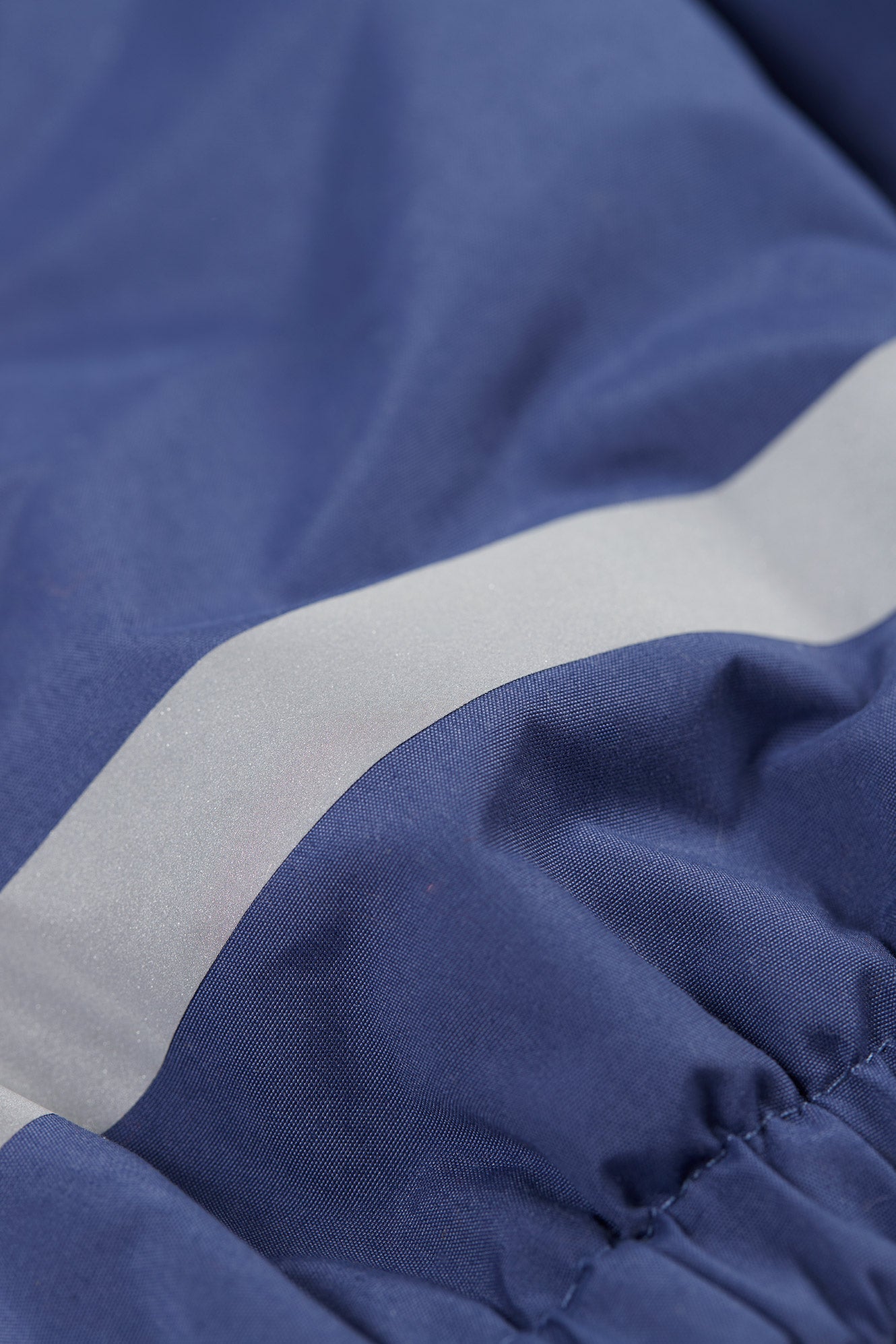 Reflective detailing on Frugi kids’ waterproof dungarees 