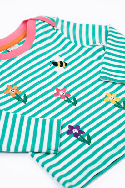 Frugi organic cotton long-sleeved top with pink trim and envelope shoulder popper fastening 