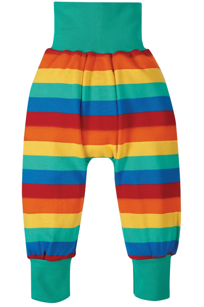 Colorful striped pants with a green top on a white background