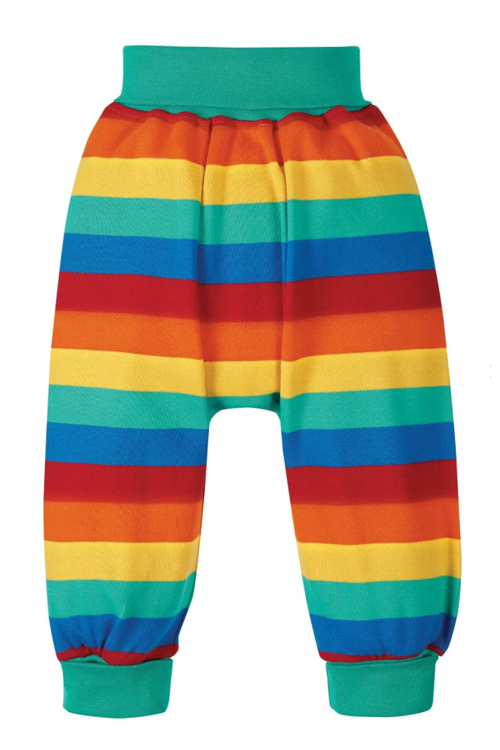 Colorful organic cotton pants with a green waistband on a white background