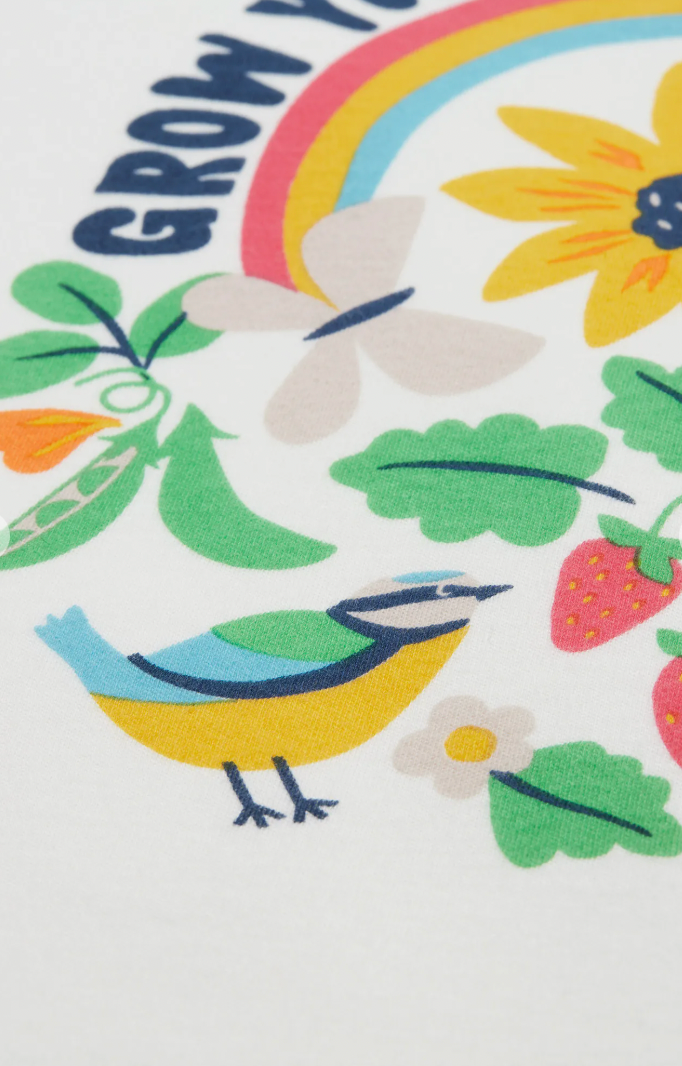 Detailed view of bird illustration on Frugi Tamar Raglan Top.