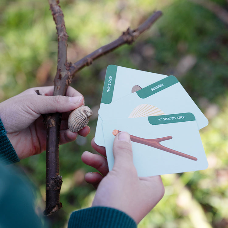 Huckleberry Scavenger Hunt cards used outdoors to find objects in nature