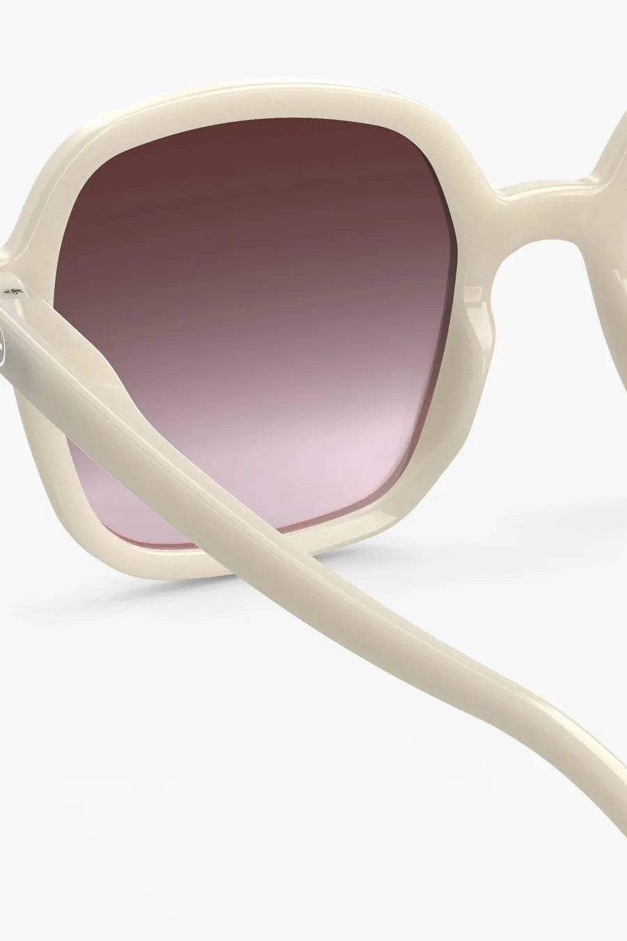 Back view of the Izipizi sunglasses, highlighting their oversized square shape and cream frame.