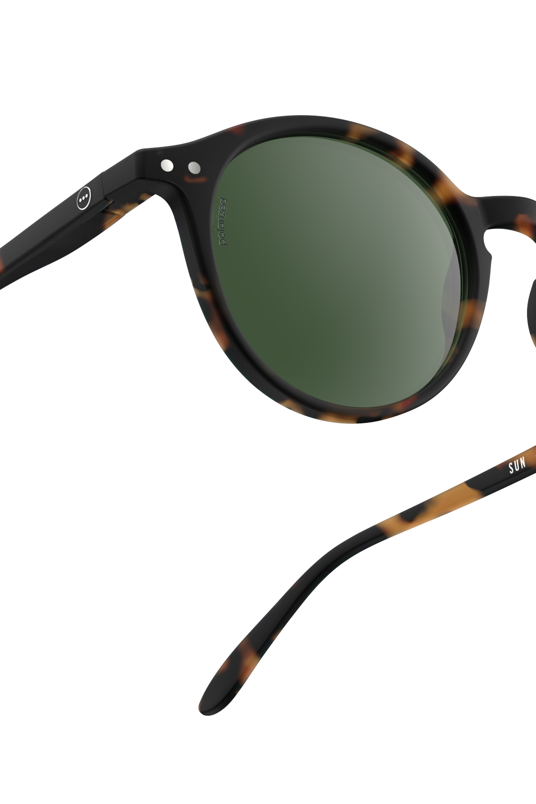 Close up of Izipizi tortoise sunglasses with polarised writing on lens 