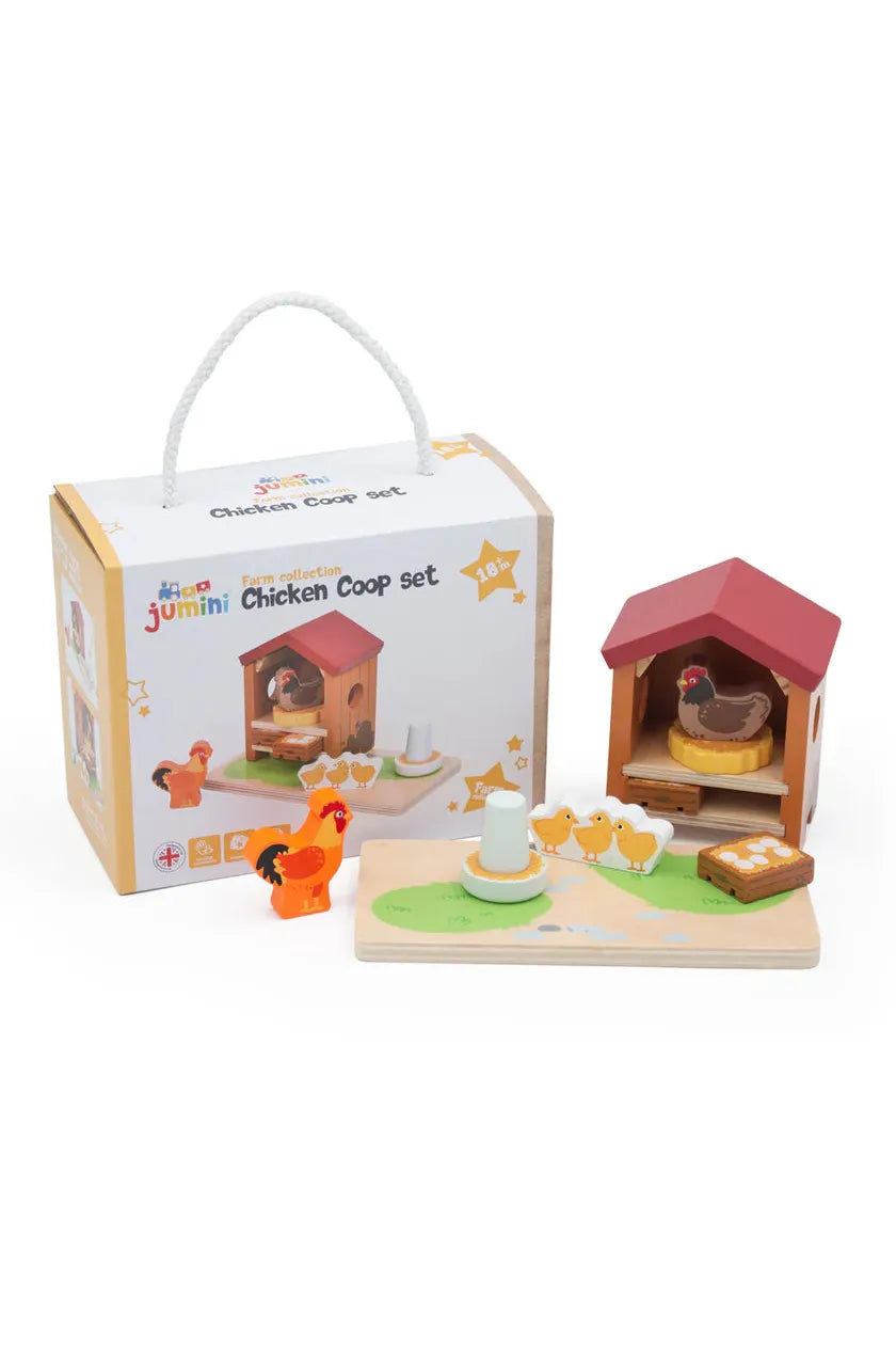 Wooden chicken coop set with packaging on a white background