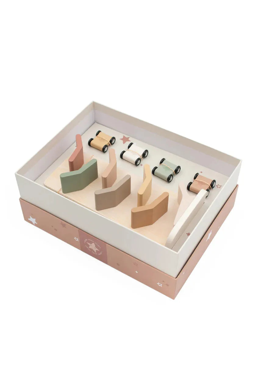 Wooden toy set in a box on a white background
