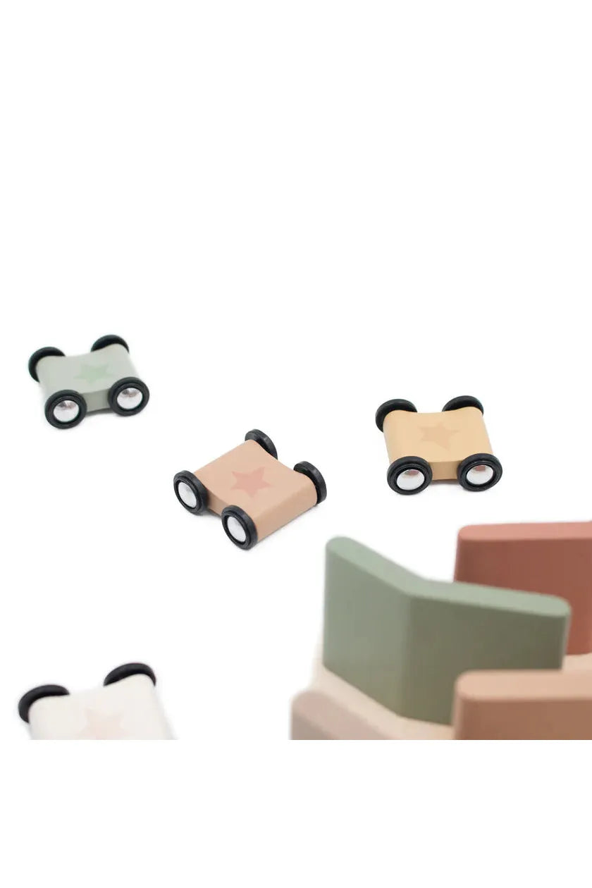 Set of panda-shaped toy cars on a white background