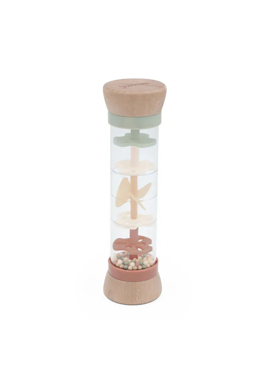 Clear bottle with wooden cap and airplane design on a white background