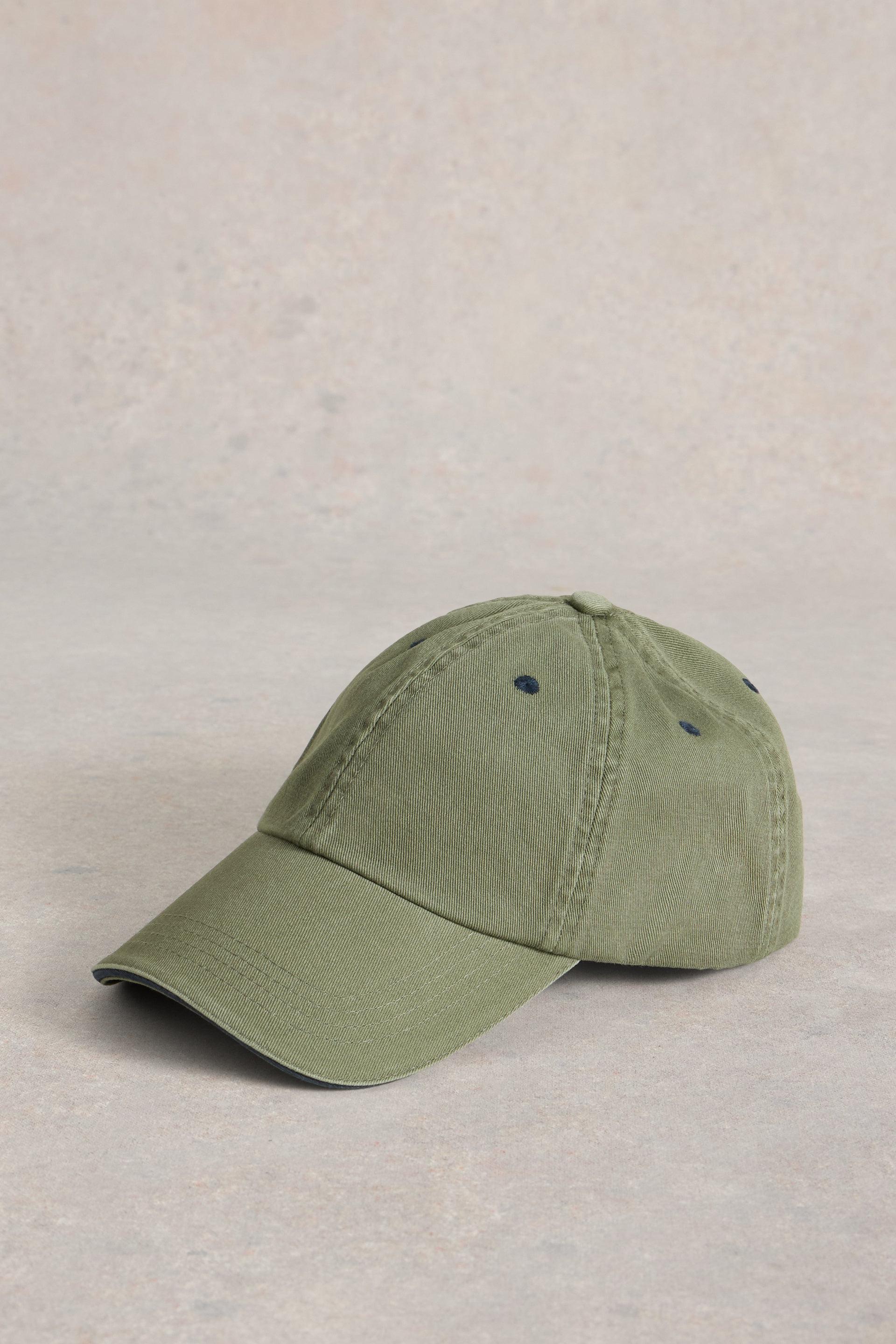 Khaki baseball cap on grey background