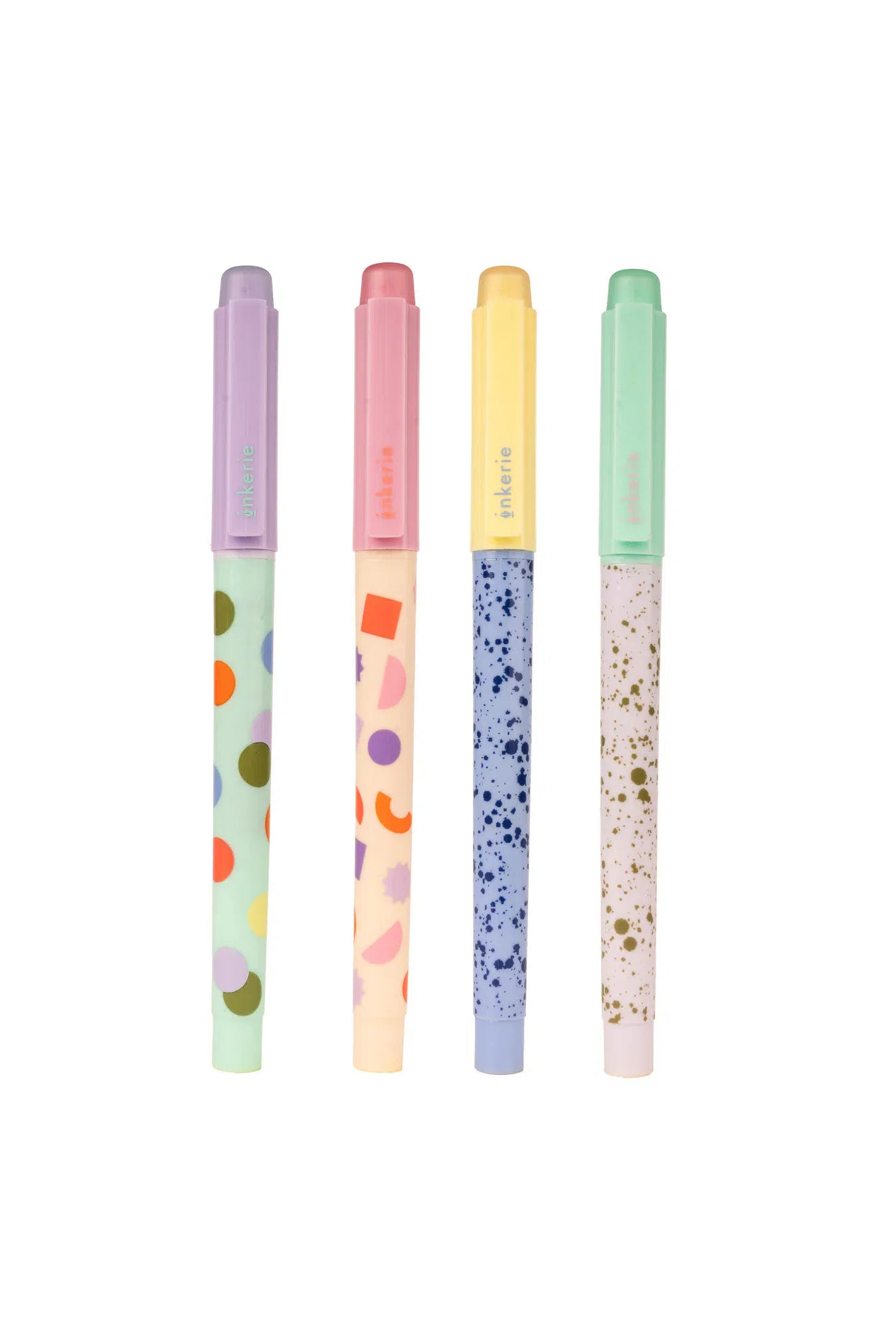All four pastel highlighters lined up, showcasing their slim design and decorative patterns.