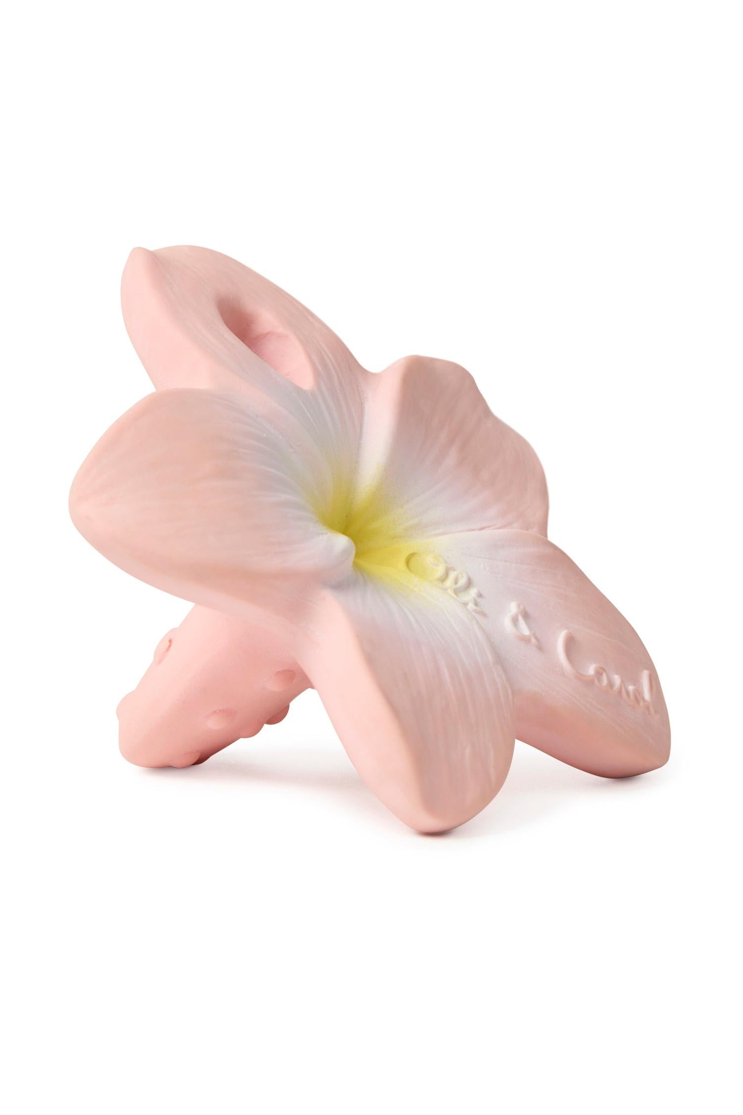 Pink 100% natural rubber flower teether on a white background