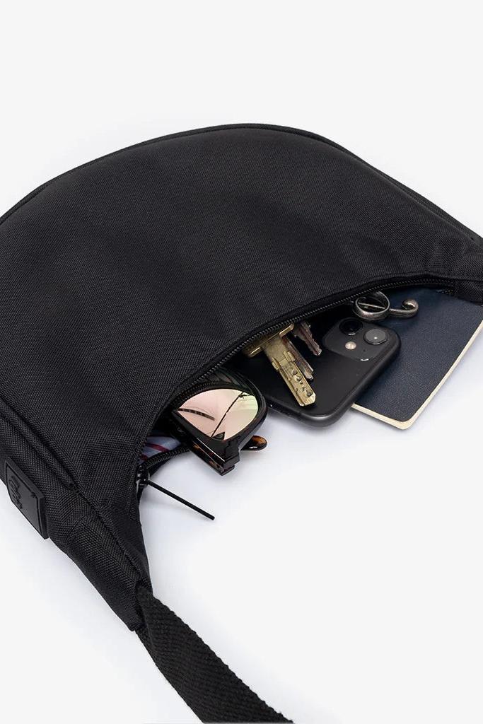 LeFrik Lua Black Bag with open zipper, revealing a spacious interior.