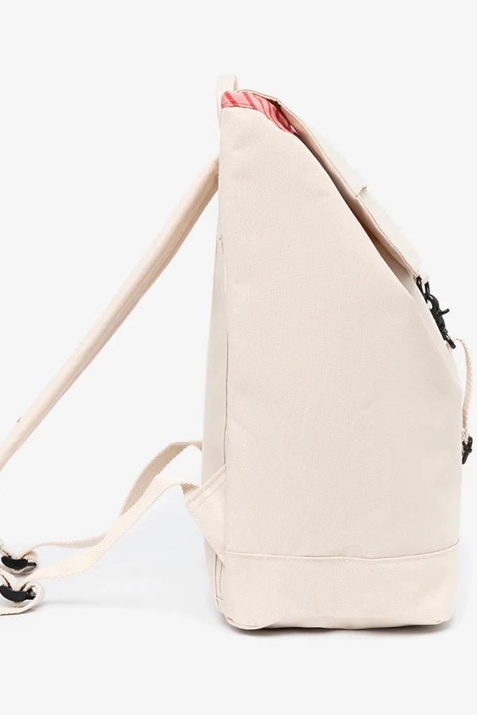 Side profile of the Lefrik Scout Backpack in Ecru Stripes, showcasing its side profile and stripes.