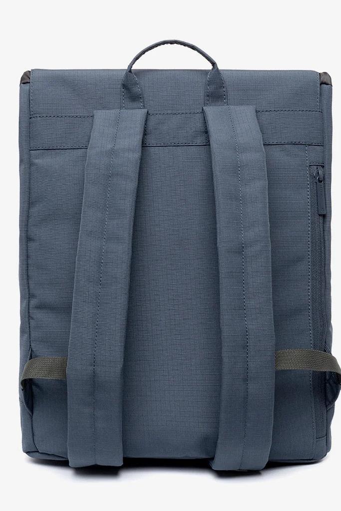 Back view of the Lefrik Scout Backpack in Maibon Vandra, displaying padded, adjustable shoulder straps and a discreet security pocket.