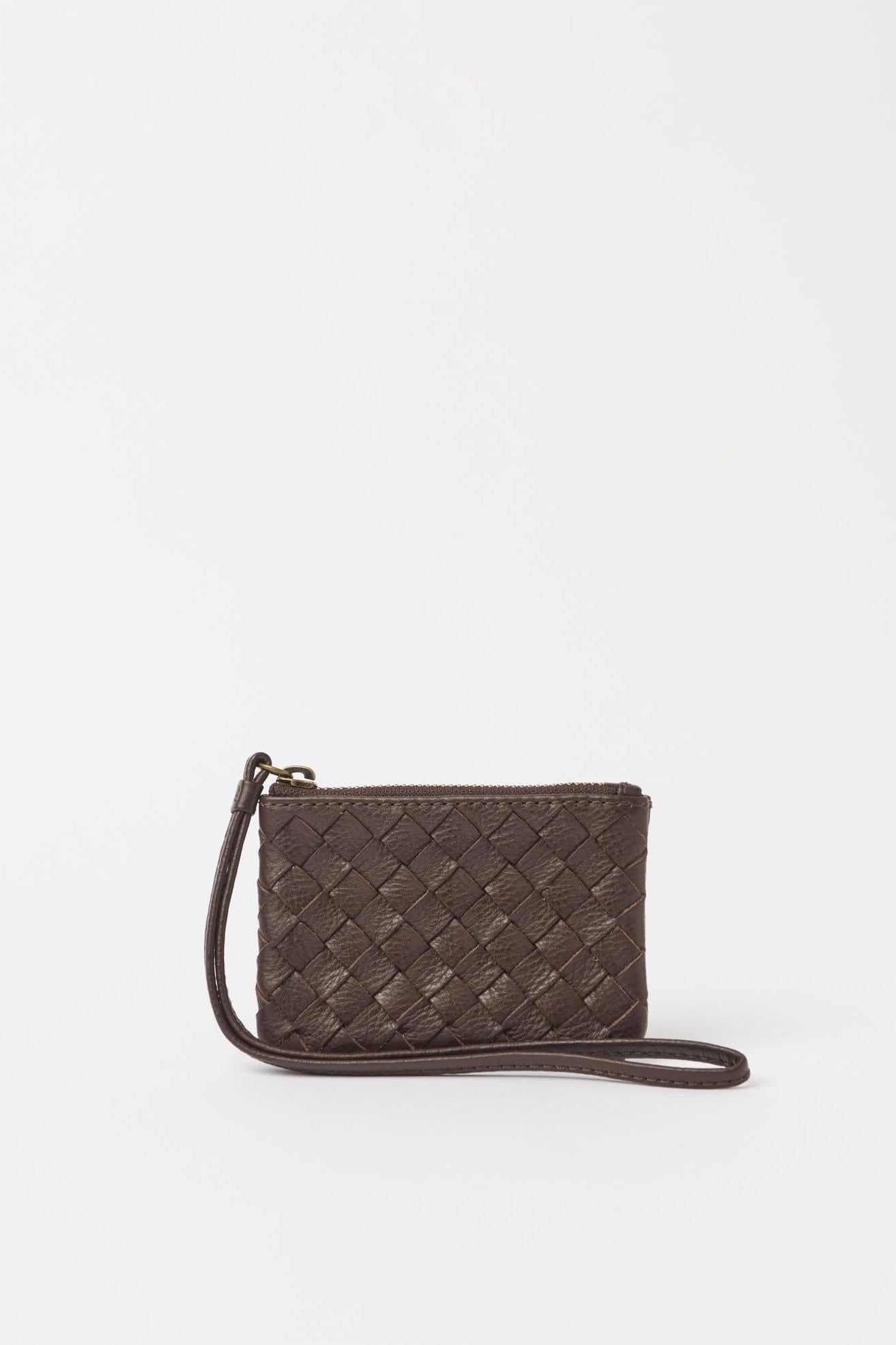 Woven leather clutch bag on a white background