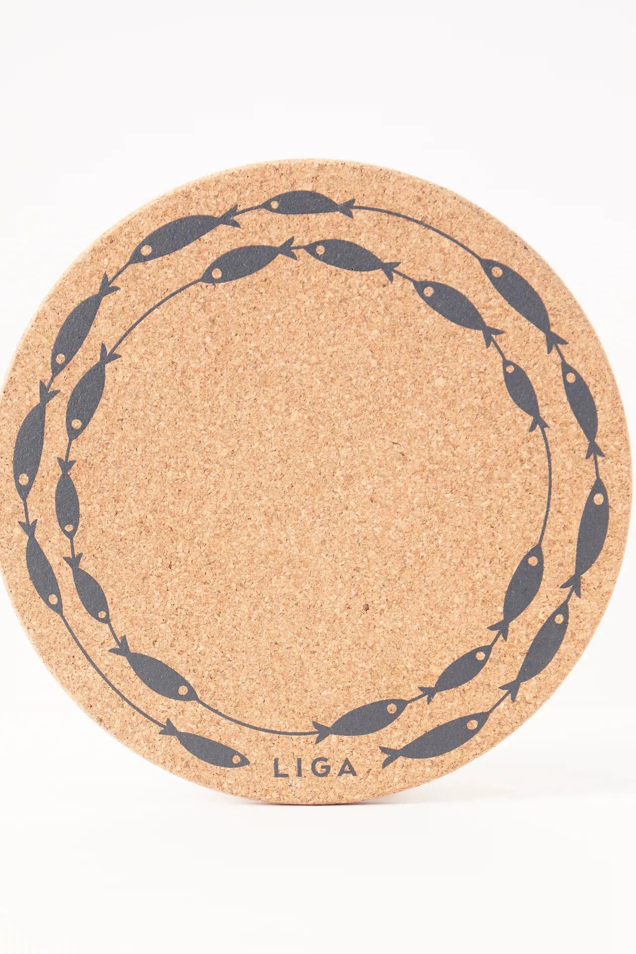 Detailed view of the Liga Cork Placemat, highlighting the fish illustration and natural cork texture.