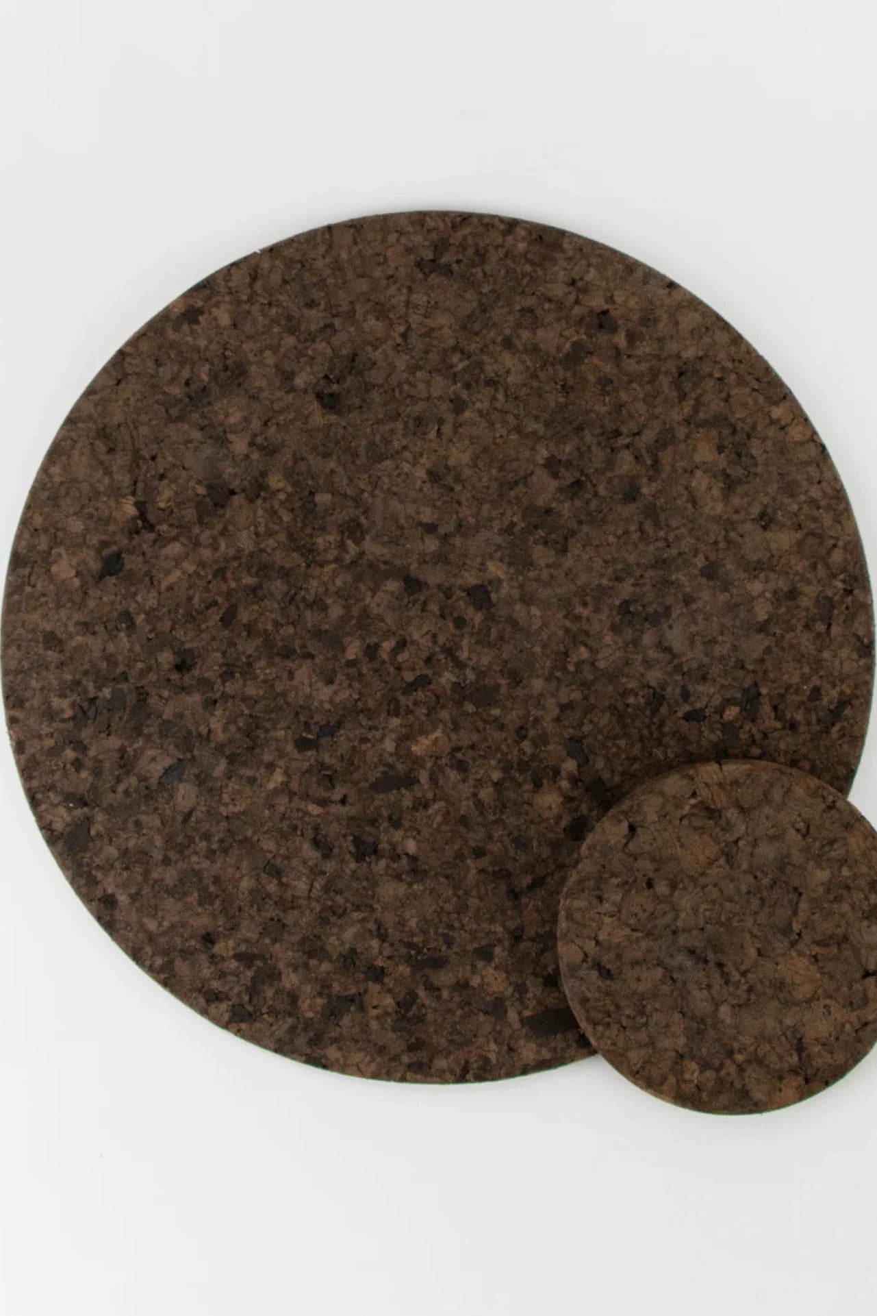 Liga Smoked Cork Round Placemat with matching coaster on top