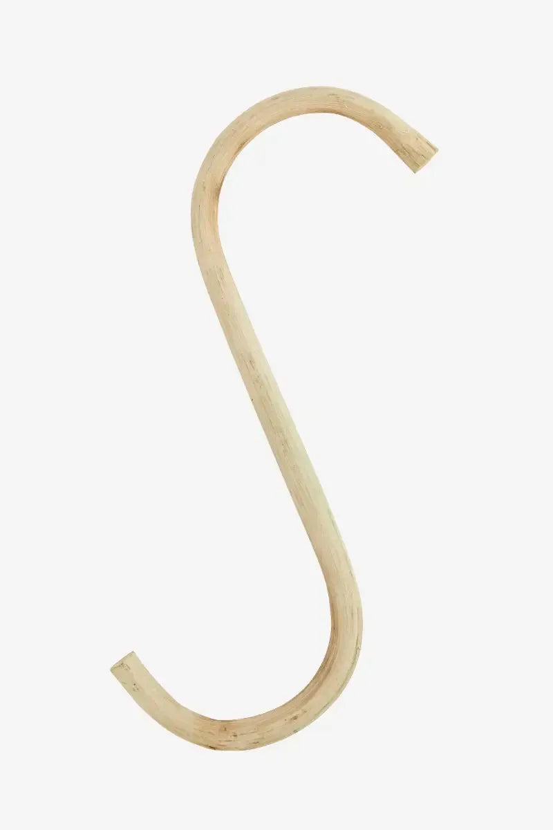 Wooden S-shaped hook on a white background