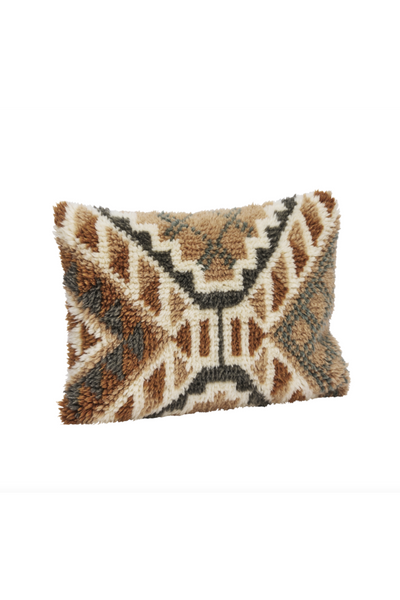 Decorative wool pillow with geometric pattern on a white background