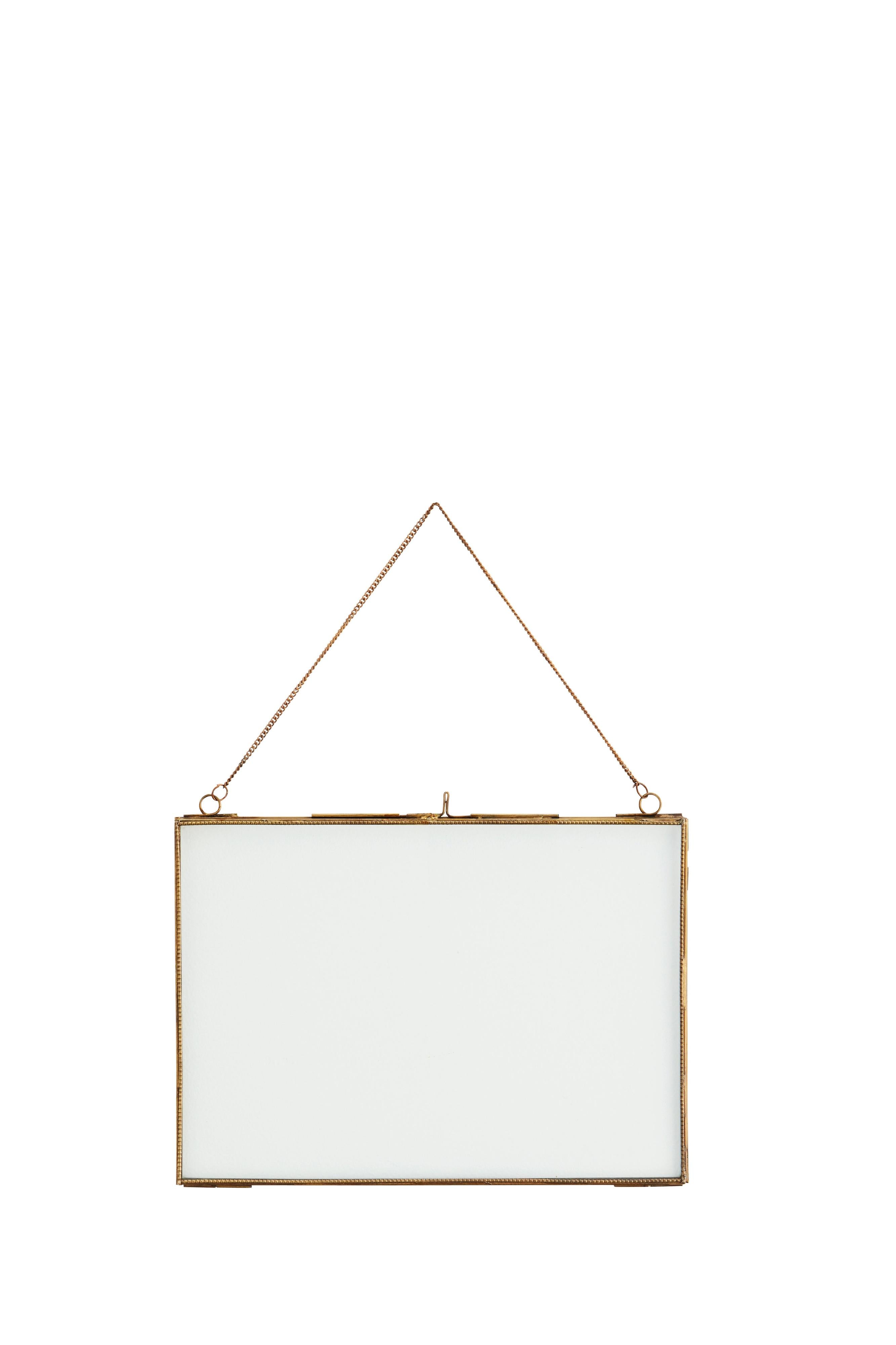 Gold-framed picture frame hanging on a white background