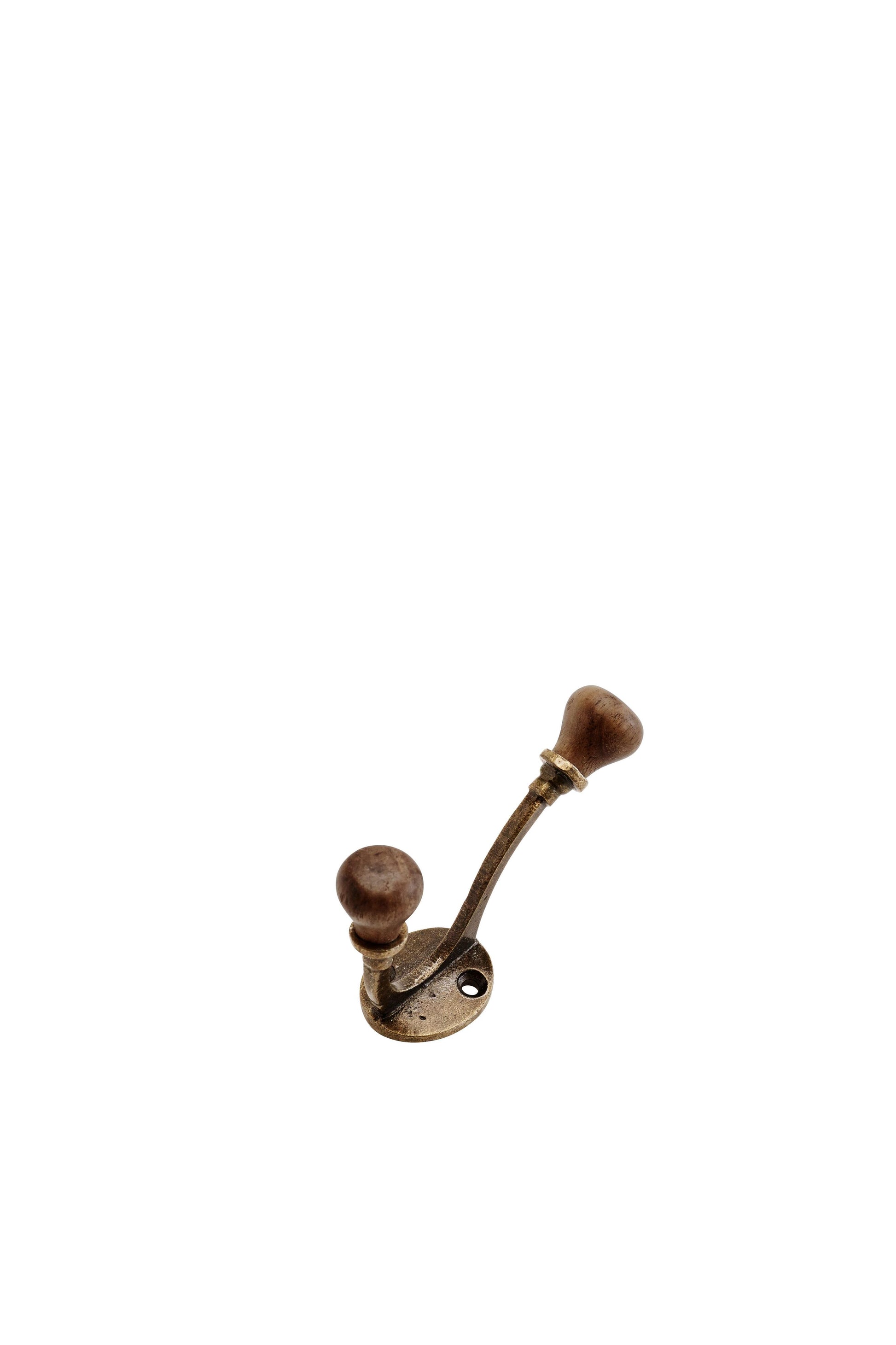 Decorative wall hook with wooden and brass finish on a white background