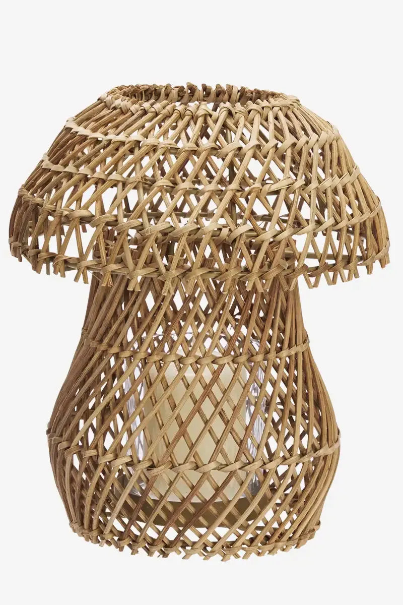 Woven rattan lantern on a white background