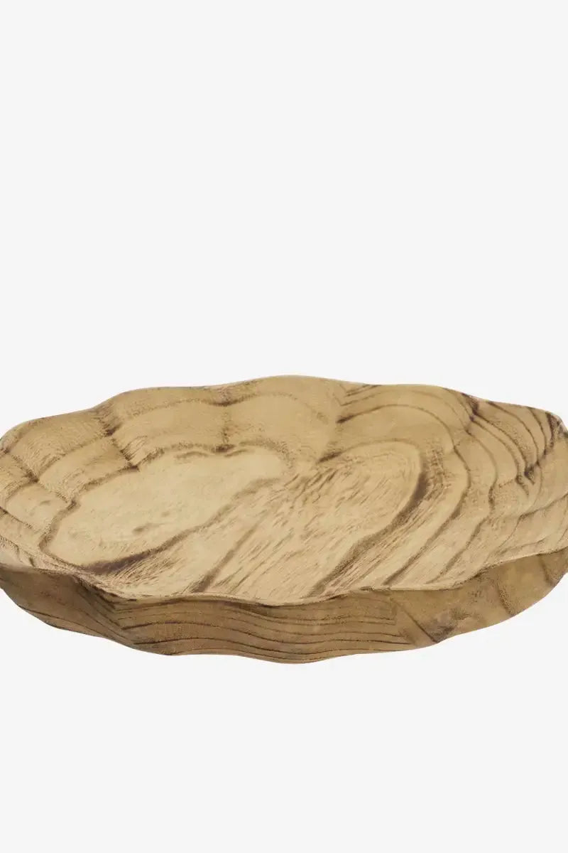 Sustainable wooden tray with wavy edge on a white background