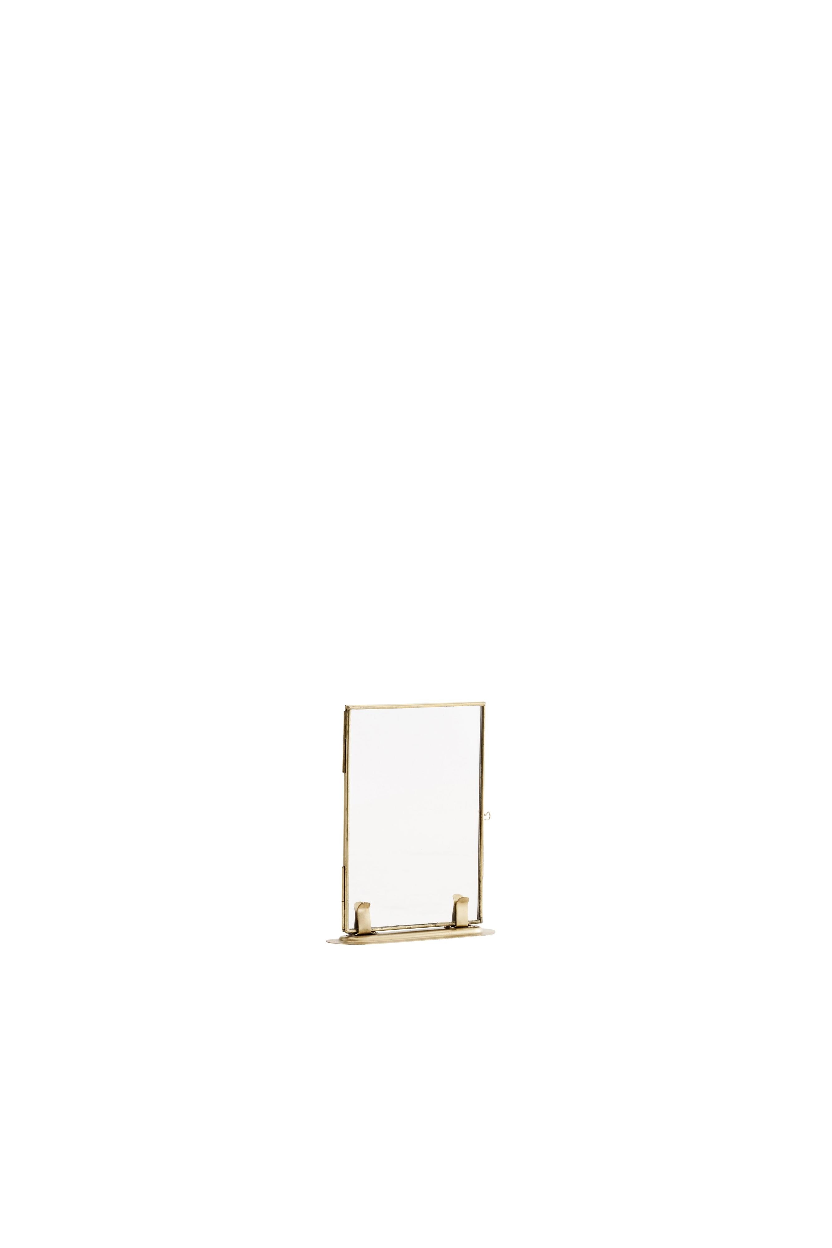 Gold-framed standing photo frame on a white background