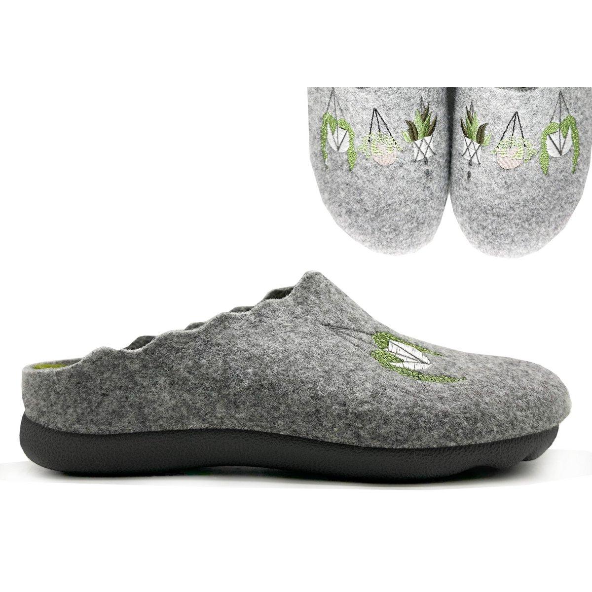 Gray slippers with green accents on a white background