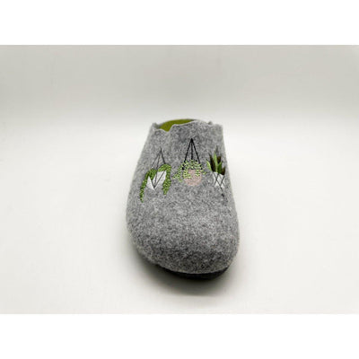 Gray felted slippers with green designs on a white background